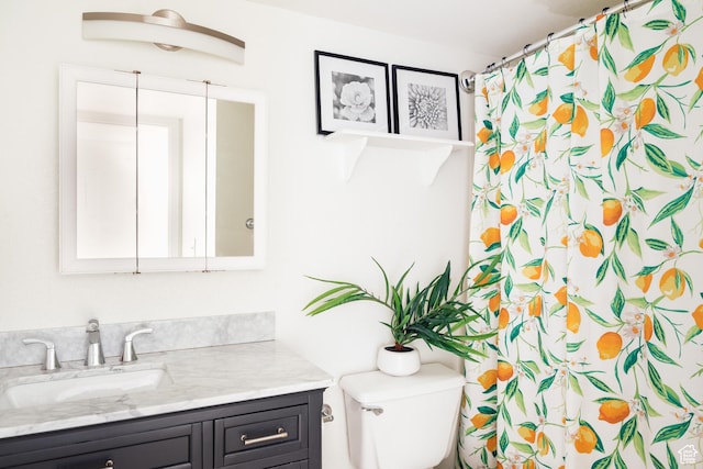 525 S 900 E Unit C1, Salt Lake City, UT 84102 - full bathroom featuring curtained shower, vanity, and toilet