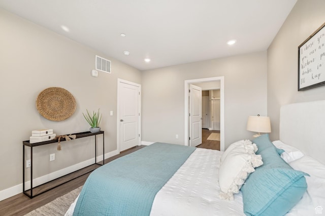 2101 N Main St W Unit 302, Sunset, UT 84015 - bedroom with recessed lighting, wood finished floors, visible vents, and baseboards
