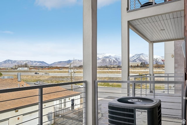 2101 N Main St W Unit 302, Sunset, UT 84015 - balcony with central AC and a mountain view
