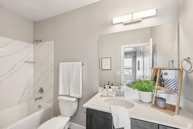 2101 N Main St W Unit 302, Sunset, UT 84015 - bathroom featuring toilet, bathing tub / shower combination, and vanity
