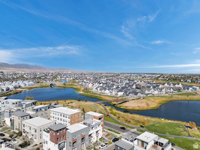aerial view with a water view and a residential view
