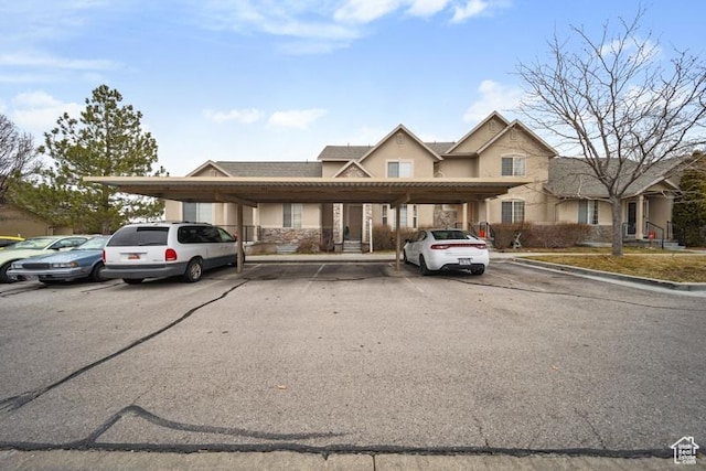 204 W Crescent View Ln N Unit 111, Tooele, UT 84074 - multi unit property featuring covered and uncovered parking