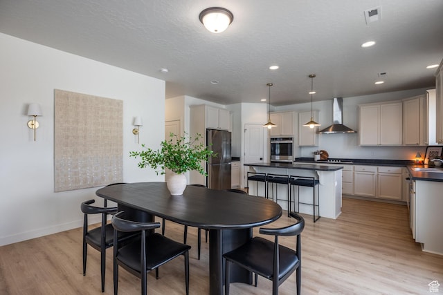 4623 N Festival Way, Eagle Mountain, UT 84005 - dining room featuring recessed lighting, baseboards, and light wood-style flooring
