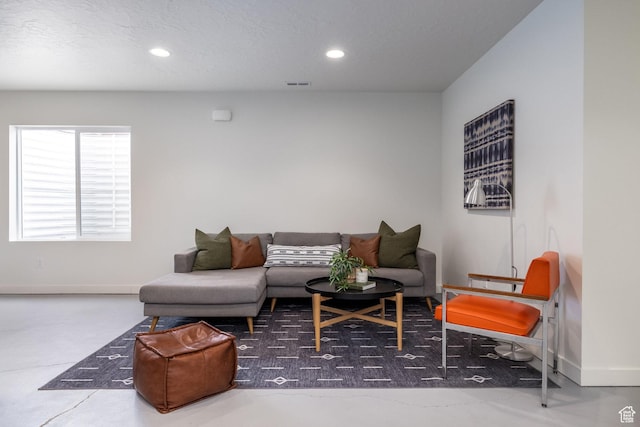 4623 N Festival Way, Eagle Mountain, UT 84005 - living area featuring baseboards, visible vents, and recessed lighting