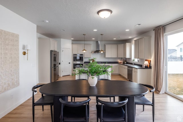 4623 N Festival Way, Eagle Mountain, UT 84005 - dining room featuring recessed lighting, light wood-style floors, and baseboards