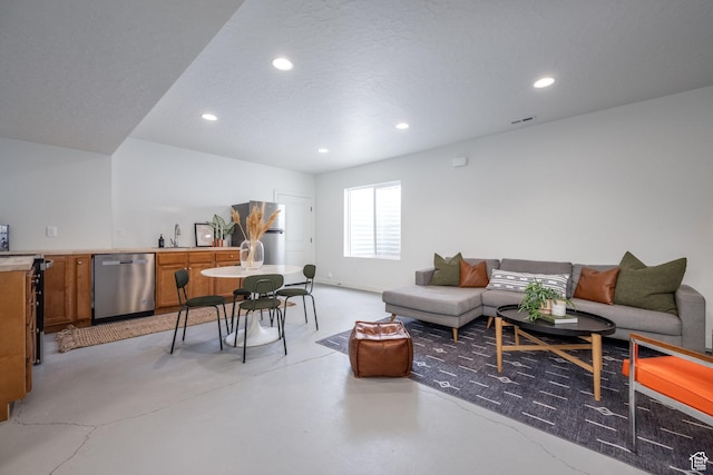 4623 N Festival Way, Eagle Mountain, UT 84005 - living room with recessed lighting, visible vents, and finished concrete flooring