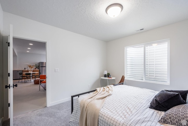 4623 N Festival Way, Eagle Mountain, UT 84005 - carpeted bedroom with freestanding refrigerator, baseboards, and visible vents