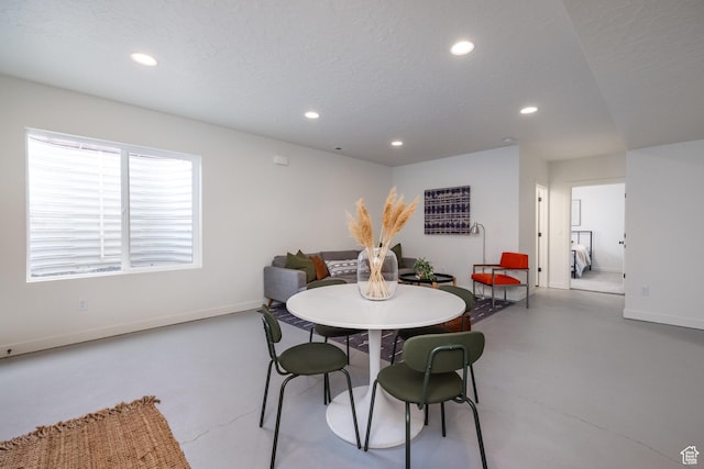 4623 N Festival Way, Eagle Mountain, UT 84005 - dining room featuring recessed lighting, concrete floors, and baseboards