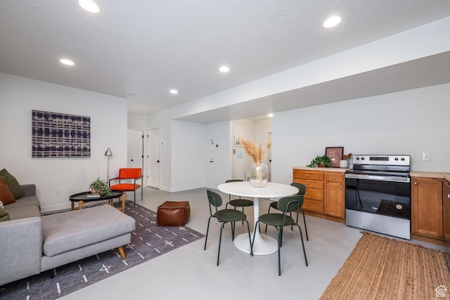 4623 N Festival Way, Eagle Mountain, UT 84005 - dining area with recessed lighting and concrete flooring