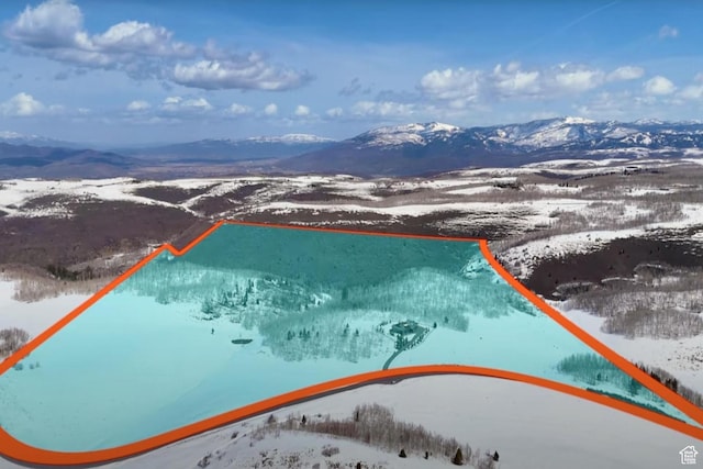 9279 E Aspen Rd, Heber City, UT 84032 - snowy aerial view with a mountain view and property boundaries highlighted
