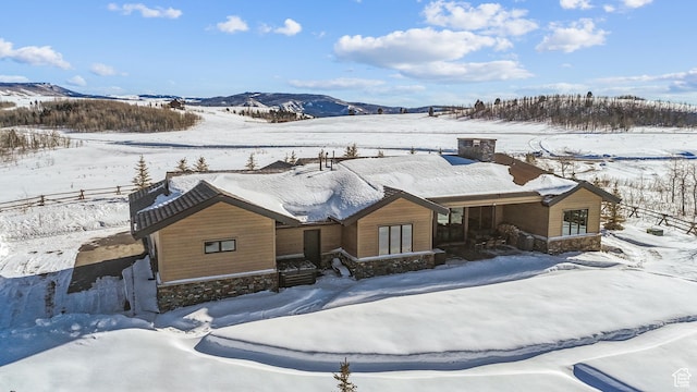 9279 E Aspen Rd, Heber City, UT 84032 - chalet / cabin featuring stone siding and a mountain view