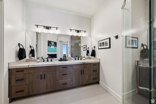 9279 E Aspen Rd, Heber City, UT 84032 - bathroom featuring double vanity, a stall shower, and tile patterned floors