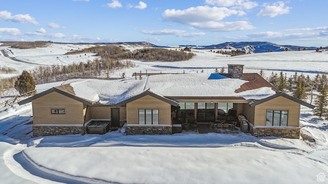 9279 E Aspen Rd, Heber City, UT 84032 - rustic home featuring stone siding and a mountain view