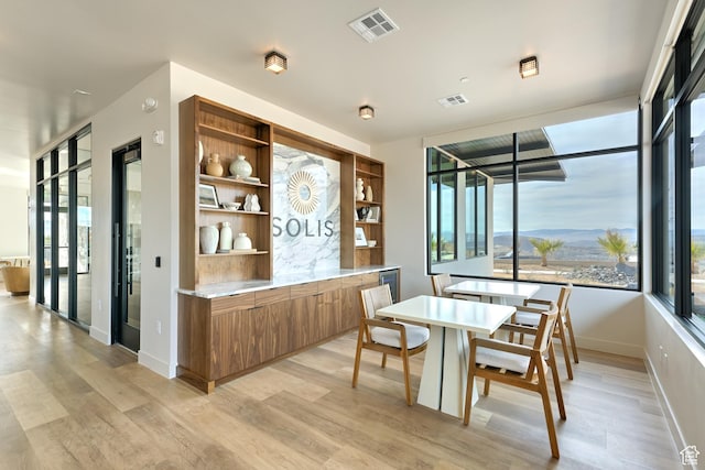 1502 N Daylight St Unit 95, Washington, UT 84780 - dining space featuring baseboards, light wood-style flooring, and visible vents