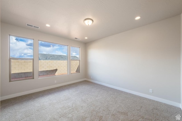 1502 N Daylight St Unit 95, Washington, UT 84780 - carpeted spare room featuring visible vents, recessed lighting, and baseboards
