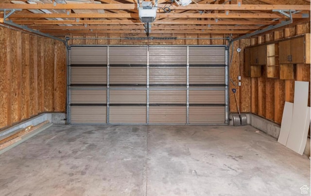 57 S Main St, Smithfield, UT 84335 - garage featuring a garage door opener