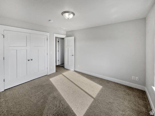 456 E 3675 N, North Ogden, UT 84414 - unfurnished bedroom featuring carpet, a closet, and baseboards