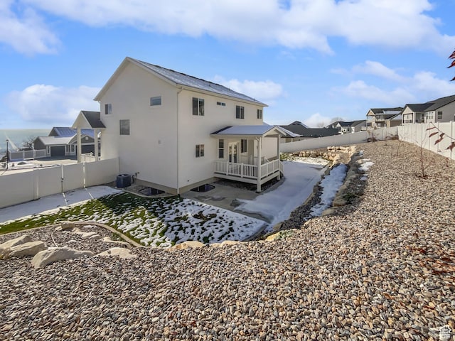 456 E 3675 N, North Ogden, UT 84414 - back of house with cooling unit, a fenced backyard, a patio, and stucco siding