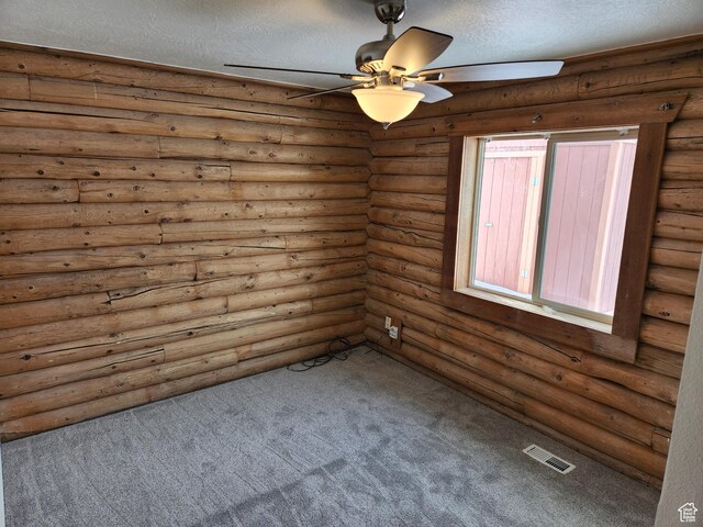 1538 N Mackinaw Way, Garden City, UT 84028 - spare room with a textured ceiling, carpet floors, ceiling fan, and visible vents