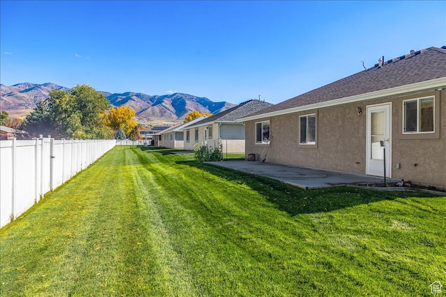 275 W 60 S, Hyde Park, UT 84318 - exterior space featuring a patio area, a fenced backyard, and a mountain view