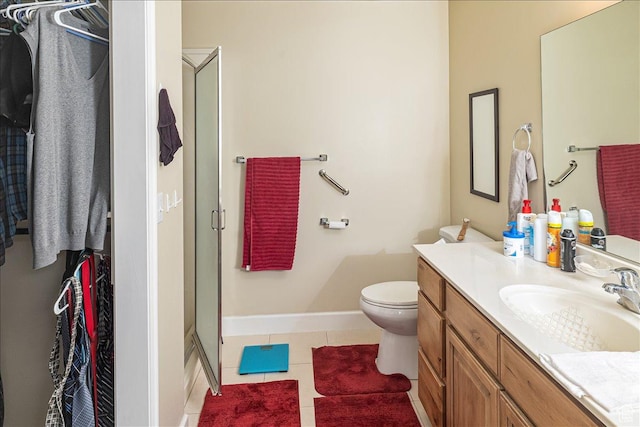 275 W 60 S, Hyde Park, UT 84318 - bathroom with a stall shower, baseboards, toilet, tile patterned floors, and vanity