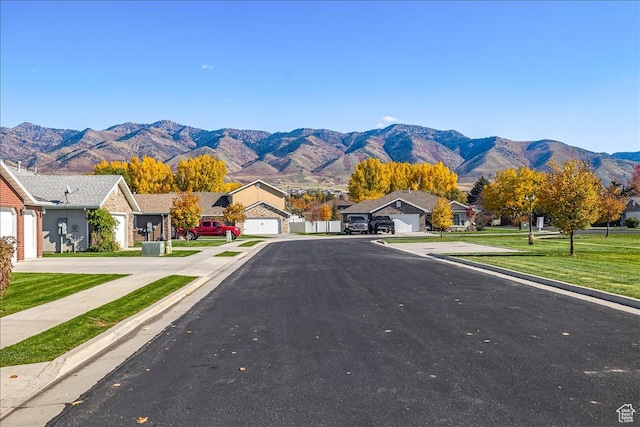 275 W 60 S, Hyde Park, UT 84318 - view of street with curbs, a residential view, sidewalks, and a mountain view