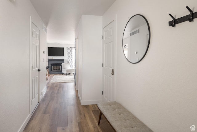 3246 E Fairway Loop, Moab, UT 84532 - hall featuring visible vents, baseboards, and wood finished floors