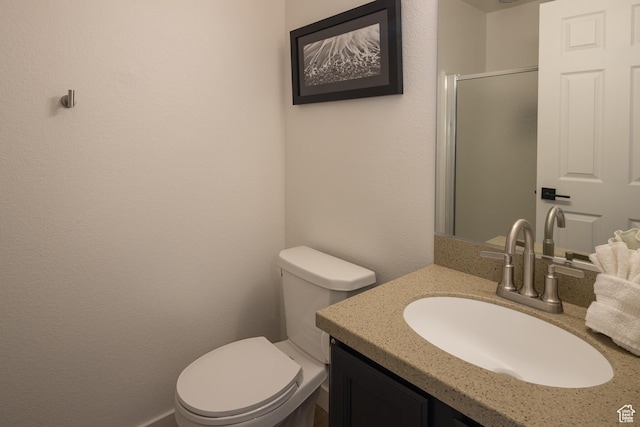 3246 E Fairway Loop, Moab, UT 84532 - bathroom featuring an enclosed shower, toilet, and vanity