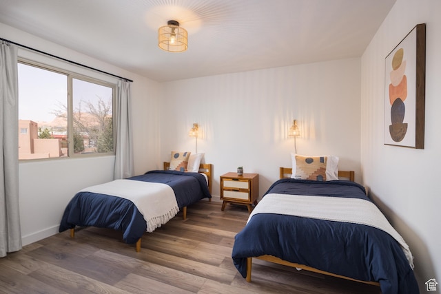 3246 E Fairway Loop, Moab, UT 84532 - bedroom with baseboards and wood finished floors