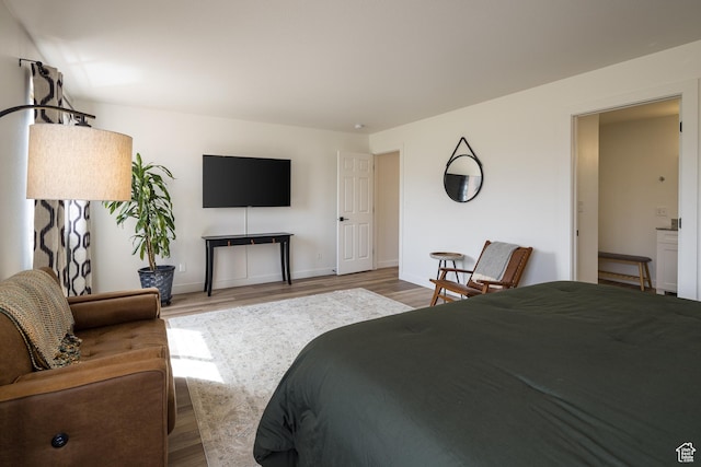 3246 E Fairway Loop, Moab, UT 84532 - bedroom featuring wood finished floors and baseboards