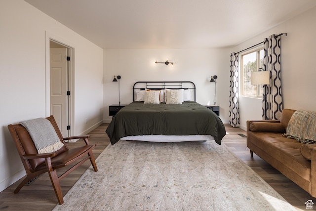 3246 E Fairway Loop, Moab, UT 84532 - bedroom featuring baseboards and wood finished floors