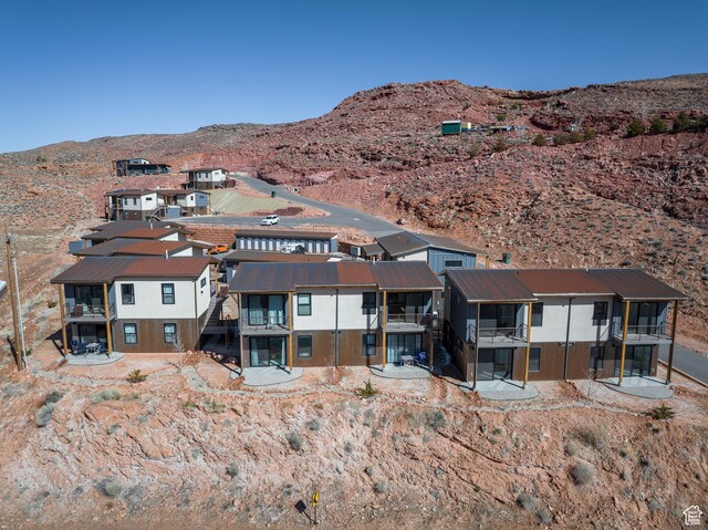 1185 S Murphy Ln Unit 105A, Moab, UT 84532 - rear view of property with a residential view and a mountain view