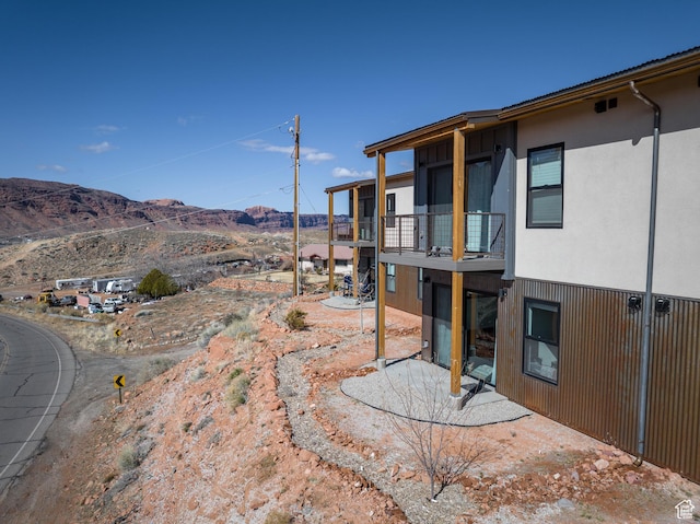 1185 S Murphy Ln Unit 105A, Moab, UT 84532 - view of yard with a mountain view and a balcony