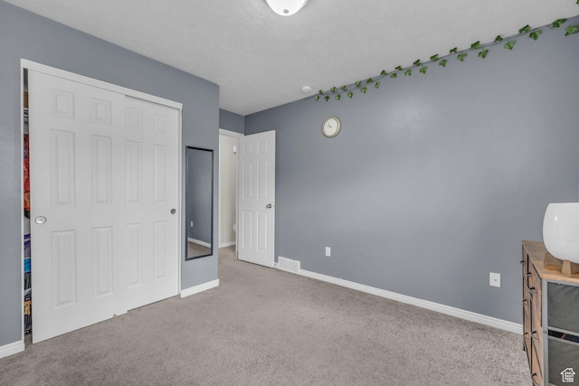 8282 S 6430 W, West Jordan, UT 84081 - unfurnished bedroom featuring a closet, carpet flooring, and baseboards