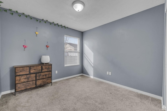 8282 S 6430 W, West Jordan, UT 84081 - carpeted spare room with baseboards and a textured ceiling