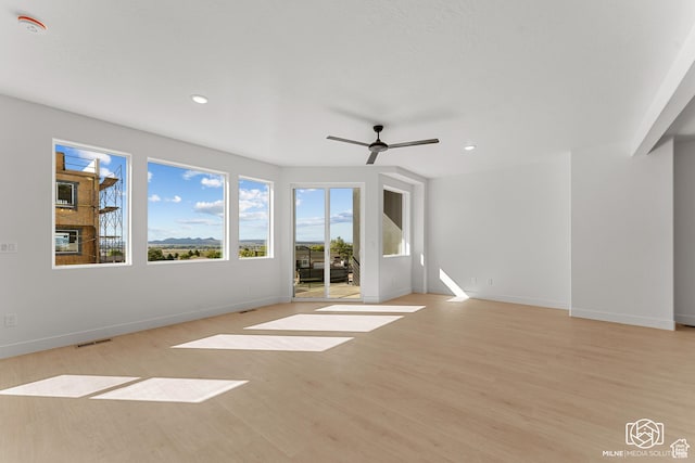 665 E 2015 N # 5E, Cedar City, UT 84721 - spare room featuring light wood finished floors, recessed lighting, a ceiling fan, and baseboards