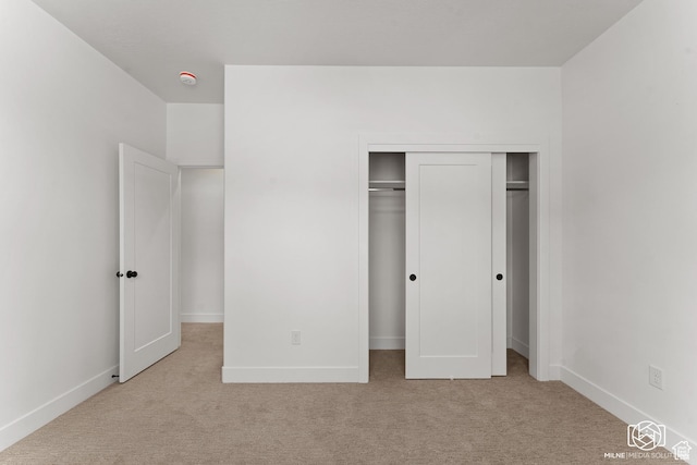 665 E 2015 N # 5E, Cedar City, UT 84721 - unfurnished bedroom with light carpet, baseboards, and a closet
