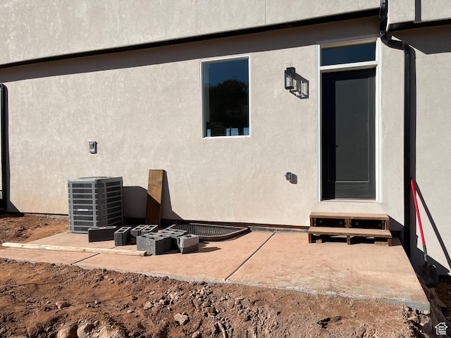 665 E 2015 N # 5E, Cedar City, UT 84721 - entrance to property with central AC, a patio, and stucco siding