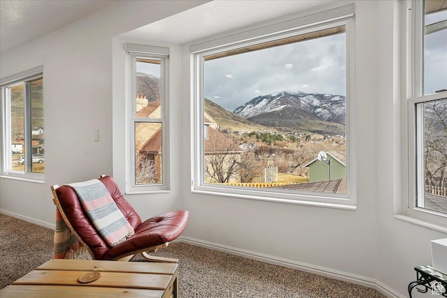 1434 Bennett Cir, Farmington, UT 84025 - living area with carpet floors, baseboards, and a mountain view