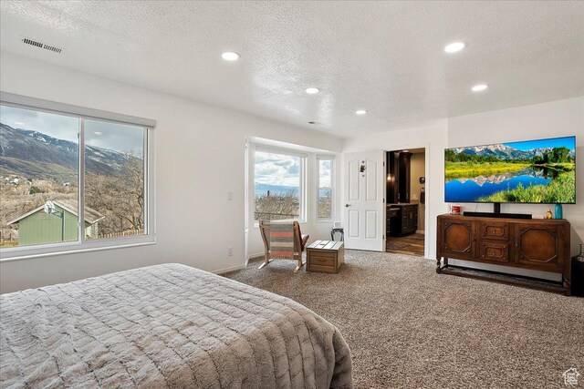 1434 Bennett Cir, Farmington, UT 84025 - bedroom with a textured ceiling, visible vents, and carpet flooring