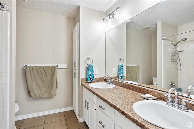 1434 Bennett Cir, Farmington, UT 84025 - bathroom featuring a sink, toilet, and tile patterned floors