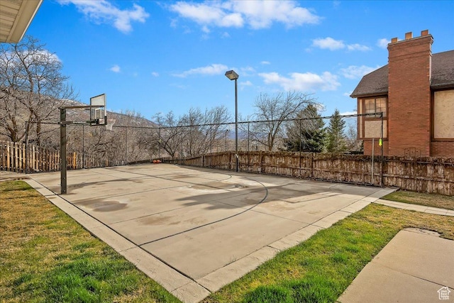 1434 Bennett Cir, Farmington, UT 84025 - view of sport court featuring fence and basketball hoop