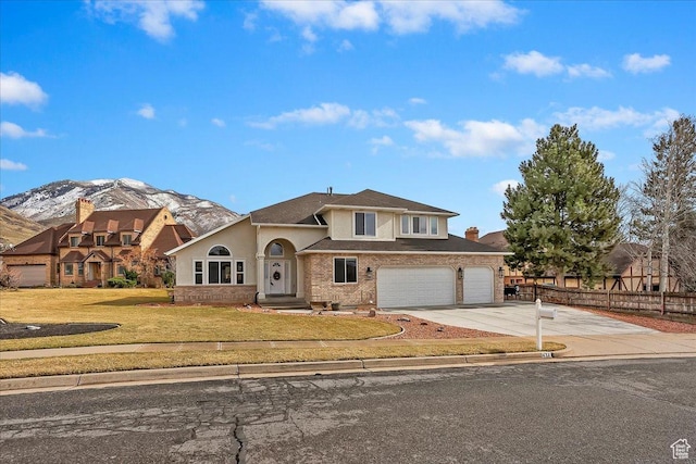 1434 Bennett Cir, Farmington, UT 84025 - view of front of home featuring a mountain view, brick siding, fence, driveway, and a front lawn