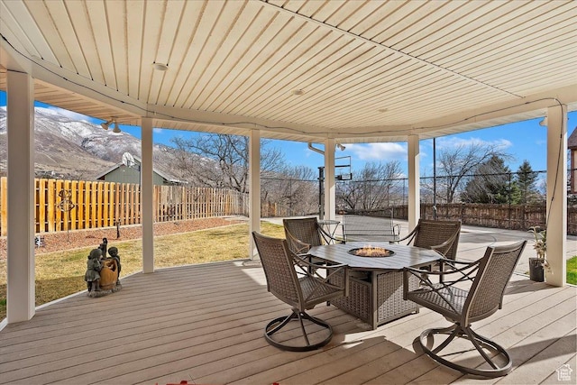 1434 Bennett Cir, Farmington, UT 84025 - deck with an outdoor fire pit and a fenced backyard