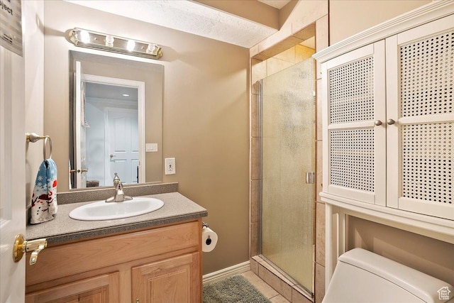 1434 Bennett Cir, Farmington, UT 84025 - bathroom with a stall shower, baseboards, vanity, and toilet
