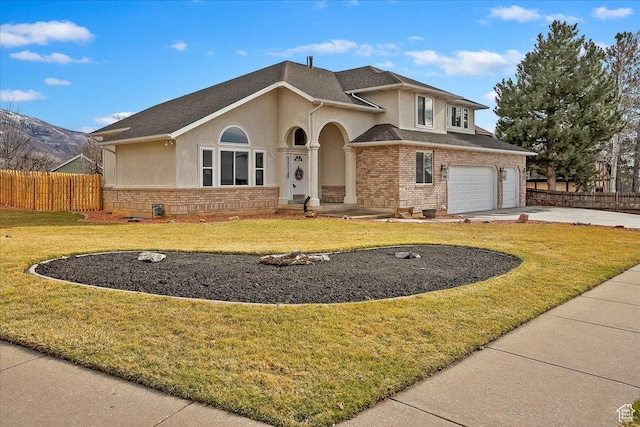 1434 Bennett Cir, Farmington, UT 84025 - view of front facade featuring a garage, brick siding, fence, driveway, and a front yard