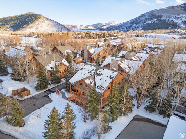 3995 N Timberwolf Ln Unit 1A, Park City, UT 84098 - snowy aerial view with a mountain view