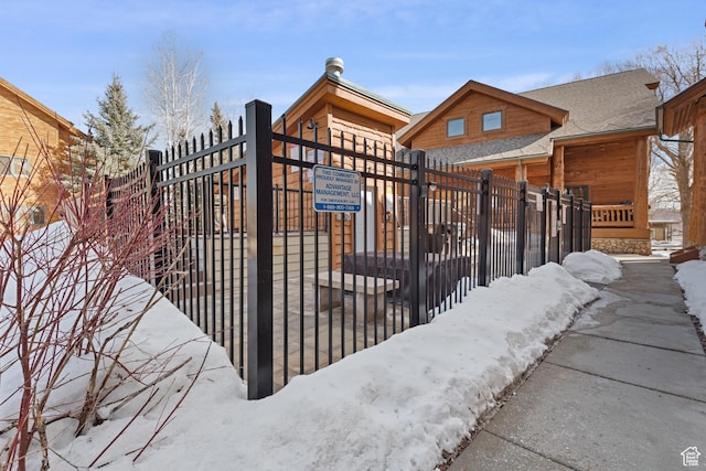 3995 N Timberwolf Ln Unit 1A, Park City, UT 84098 - snow covered gate with fence