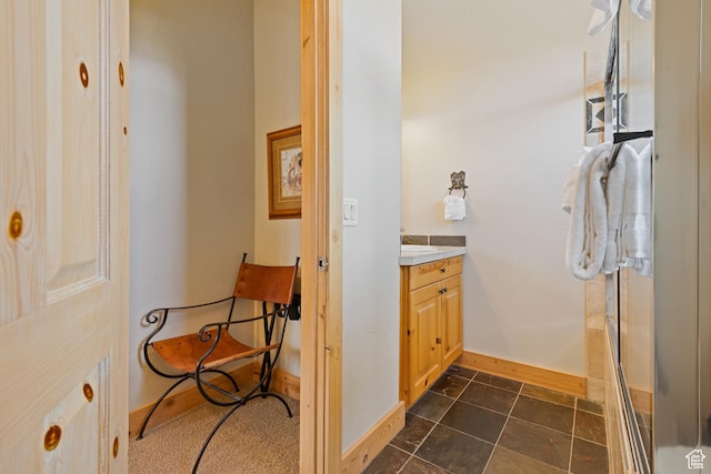 3995 N Timberwolf Ln Unit 1A, Park City, UT 84098 - bathroom featuring tile patterned flooring, vanity, and baseboards