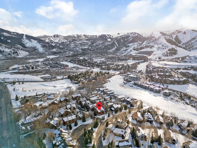 3995 N Timberwolf Ln Unit 1A, Park City, UT 84098 - snowy aerial view with a residential view and a mountain view
